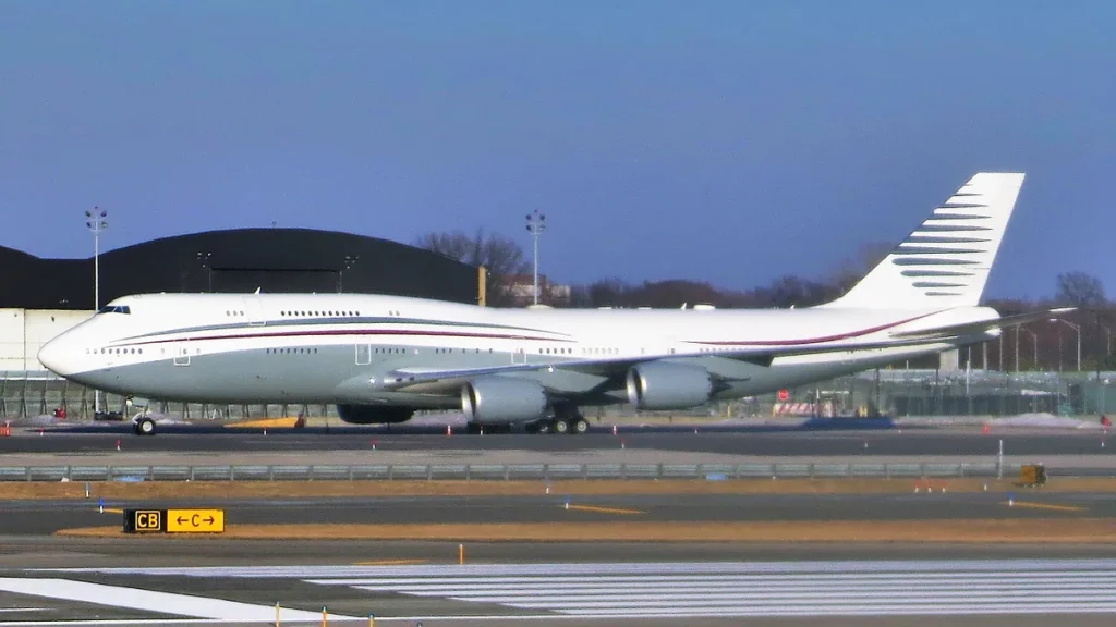 A Qatar Amiri Flight Boeing 747-8 business jet parked at John F. Kennedy International Airport.