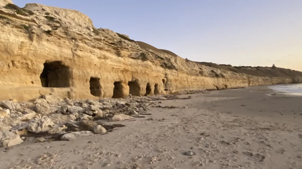 Illustrative: the beach at Port Willunga on the Fleurieu Peninsula, South Australia, photographed in August 2020. The photograph does not show the algal bloom or any scene described in the article.