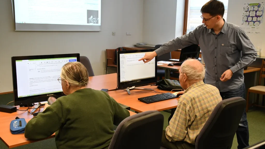 Illustrative - older people using computers in a public library. This photograph is not from the study described in the article.