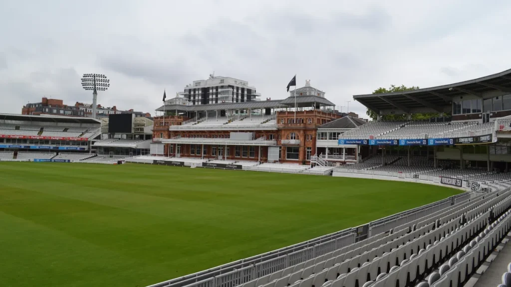 The empty Lord's Cricket Ground in London, looking towards the Pavilion across the outfield.